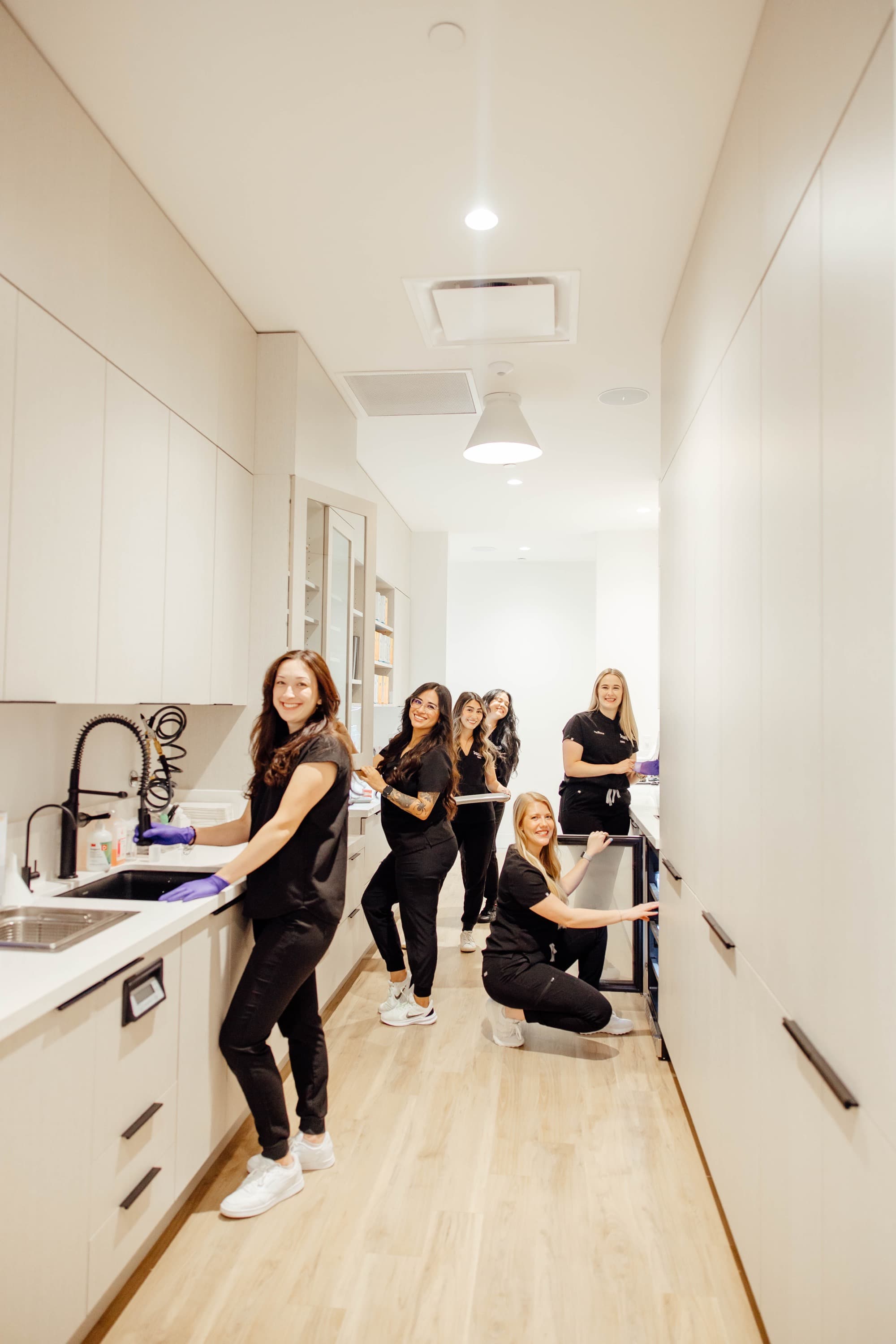 Kunik Orthodontics team in the office hallway